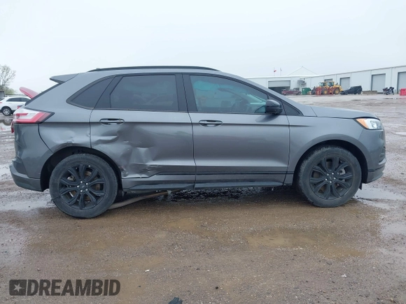 2023 Ford Edge SE z VIN 2FMPK4G95PBA41278, wystawiony jako IAAI lot #41964995 z przebiegiem 21 079 mil mil oraz . Historia ofert i sprzedaży dostępna na DreamBid. Obrazek 6.