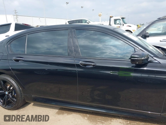 2017 BMW 7 Series 750i with VIN WBA7F0C55HGM21460, listed as a IAAI auction lot 41934198 with 58,206 mi miles and . Bid and sale history available at DreamBid. Image 13.