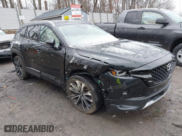 2024 Mazda CX-50 Premium z VIN 7MMVABDYXRN180263, wystawiony jako IAAI lot #41738791 z przebiegiem 9 688 mil mil oraz . Historia ofert i sprzedaży dostępna na DreamBid. Obrazek 1.
