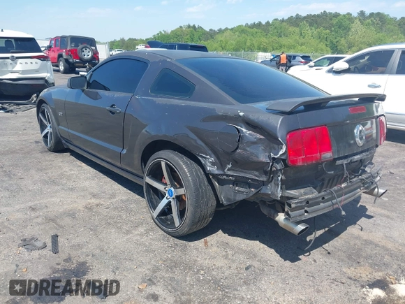 2007 Ford Mustang GT Deluxe with VIN 1ZVFT82H575237242, listed as a IAAI auction lot 42011930 with 223,858 mi miles. Bid and sale history available at carsss.com. Image 3.