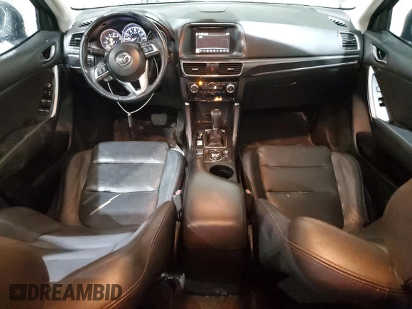 2016 Mazda CX-5 Grand Touring z VIN JM3KE2DY5G0821683, wystawiony jako Copart lot #51929905 z przebiegiem 119 392 mil mil oraz Czysty tytuł • Clean title. Historia ofert i sprzedaży dostępna na DreamBid. Obrazek 8.