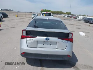 2020 Toyota Prius L Eco with VIN JTDKARFU5L3117287, listed as a IAAI auction lot 42202426 with 122,870 mi miles and . Bid and sale history available at DreamBid. Image 16.