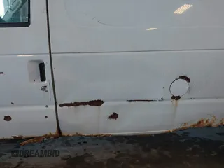 2003 Ford Econoline Cargo z VIN 1FTNE24W53HA22180, wystawiony jako IAAI lot #42206484 z przebiegiem 306 921 mil mil oraz . Historia ofert i sprzedaży dostępna na DreamBid. Obrazek 14.