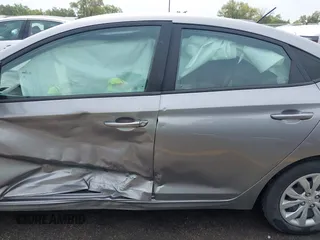 2022 Hyundai Accent SE z VIN 3KPC24A67NE183607, wystawiony jako IAAI lot #41948466 z przebiegiem 68 155 mil mil oraz . Historia ofert i sprzedaży dostępna na DreamBid. Obrazek 14.