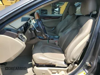 2012 Cadillac CTS Luxury with VIN 1G6DE5E54C0138040, listed as a Copart auction lot 61997305 with 140,996 mi miles and Salvage title. Bid and sale history available at DreamBid. Image 7.