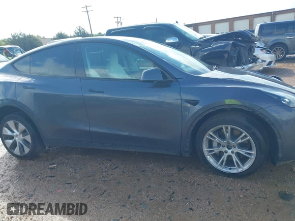 2023 Tesla Model Y Long Range with VIN 7SAYGDEE2PF674286, listed as a IAAI auction lot 42010275 with Not Provided miles and . Bid and sale history available at carsss.com. Image 13.