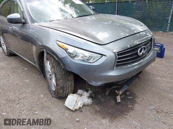 2014 Infiniti QX70 with VIN JN8CS1MW9EM413406, listed as a IAAI auction lot 40269302 with 123,957 mi miles and . Bid and sale history available at DreamBid. Image 6.