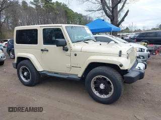 2012 Jeep Wrangler Arctic с VIN 1C4AJWBG1CL103607, выставлен на аукционе IAAI как лот 42004802 с пробегом 72 030 миль миль и . История ставок и продаж доступна на DreamBid. Изображение 13.