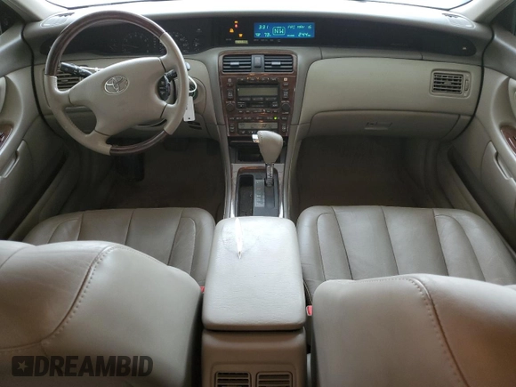 2003 Toyota Avalon XL z VIN 4T1BF28B03U280486, wystawiony jako Copart lot #57152935 z przebiegiem 131 996 mil mil oraz Szkoda całkowita • Salvage title. Historia ofert i sprzedaży dostępna na DreamBid. Obrazek 8.