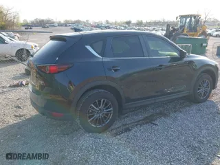 2021 Mazda CX-5 Touring with VIN JM3KFACM5M1313631, listed as a IAAI auction lot 41928912 with 41,448 mi miles. Bid and sale history available at carsss.com. Image 4.