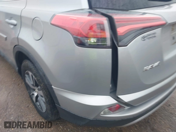 2018 Toyota RAV4 XLE with VIN 2T3WFREV3JW445654, listed as a IAAI auction lot 40849666 with 69,365 mi miles and . Bid and sale history available at DreamBid. Image 18.