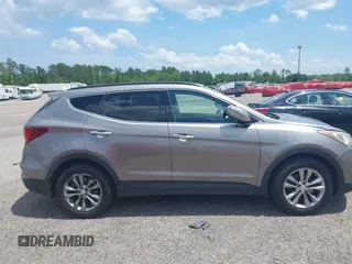 2018 Hyundai Santa Fe 2.0T с VIN 5NMZU4LAXJH057363, выставлен на аукционе IAAI как лот 42265981 с пробегом 118 536 миль миль и . История ставок и продаж доступна на DreamBid. Изображение 13.
