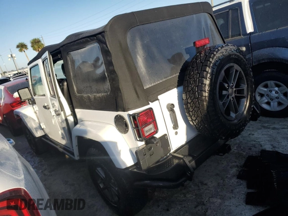 2018 Jeep Wrangler JK Unlimited Freedom Edition with VIN 1C4BJWDG2JL805031, listed as a Copart auction lot 73987524 with 0 mi miles and Non Repairable. Bid and sale history available at carsss.com. Image 2.