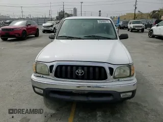 2003 Toyota Tacoma z VIN 5TEVL52NX3Z229020, wystawiony jako Copart lot #59898675 z przebiegiem 83 603 mil mil oraz Szkoda całkowita • Salvage title. Historia ofert i sprzedaży dostępna na DreamBid. Obrazek 13.