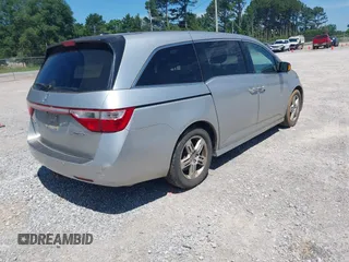 2012 Honda Odyssey Touring с VIN 5FNRL5H99CB008201, выставлен на аукционе IAAI как лот 42308147 с пробегом 217 715 миль миль и . История ставок и продаж доступна на DreamBid. Изображение 4.