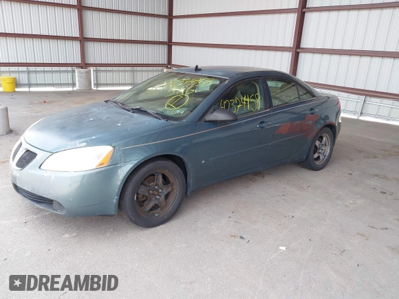 2009 Pontiac G6 1SA with VIN 1G2ZG57B694157985, listed as a IAAI auction lot 42374458 with 202,323 mi miles and . Bid and sale history available at DreamBid. Image 2.
