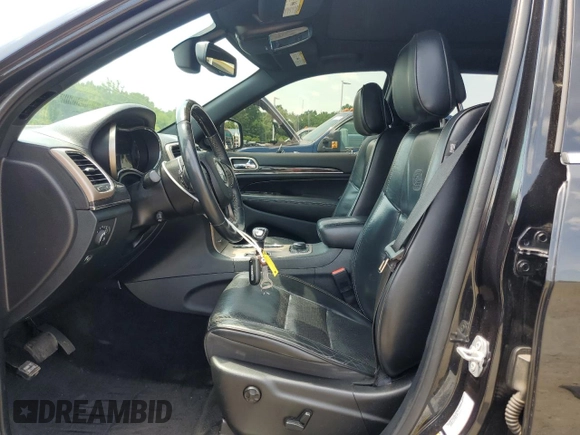 2015 Jeep Grand Cherokee Overland с VIN 1C4RJFCG4FC104420, выставлен на аукционе Copart как лот 66014955 с пробегом 165 645 миль миль и Списание • Salvage title. История ставок и продаж доступна на DreamBid. Изображение 7.