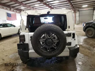 2015 Jeep Wrangler Unlimited Wrangler X with VIN 1C4HJWEG7FL671259, listed as a Copart auction lot 52334325 with 81,244 mi miles and Clean title. Bid and sale history available at DreamBid. Image 6.
