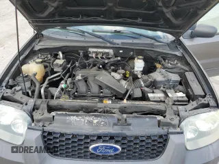 2006 Ford Escape XLT with VIN 1FMYU03136KD47701, listed as a Copart auction lot 58008695 with 176,341 mi miles and Salvage title. Bid and sale history available at DreamBid. Image 12.