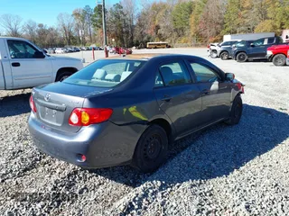 2010 Toyota Corolla with VIN 2T1BU4EE3AC316203, listed as a IAAI auction lot 35972106 with 198,544 mi miles. Bid and sale history available at carsss.com. Image 4.