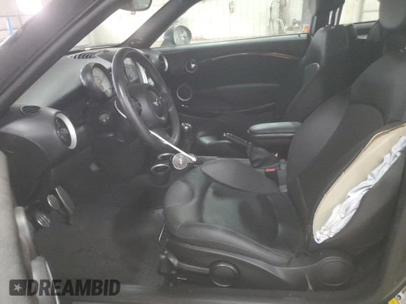 2012 MINI Coupe S z VIN WMWSX3C51CT408195, wystawiony jako Copart lot #77008744 z przebiegiem Nie podano mil oraz Szkody całkowita. Historia ofert i sprzedaży dostępna na DreamBid. Obrazek 7.