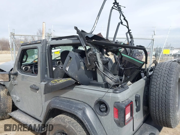 2018 Jeep Wrangler Sport S with VIN 1C4GJXAGXJW197483, listed as a IAAI auction lot 41825305 with 64,173 mi miles and . Bid and sale history available at DreamBid. Image 6.