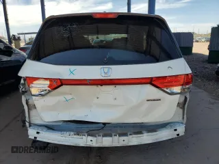 2014 Honda Odyssey Touring с VIN 5FNRL5H94EB110797, выставлен на аукционе Copart как лот 60702365 с пробегом 106 131 миль миль и Списание • Salvage title. История ставок и продаж доступна на DreamBid. Изображение 6.