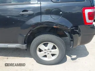 2011 Ford Escape XLT z VIN 1FMCU9D71BKA12061, wystawiony jako IAAI lot #42635447 z przebiegiem 195 433 mil mil oraz . Historia ofert i sprzedaży dostępna na DreamBid. Obrazek 6.