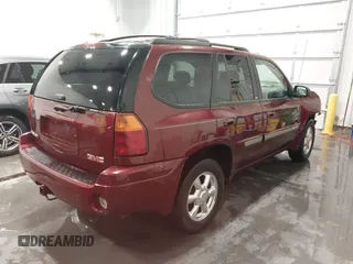 2005 GMC Envoy SLT with VIN 1GKDT13S752214687, listed as a IAAI auction lot 41421248 with 145,388 mi miles. Bid and sale history available at carsss.com. Image 4.