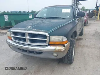 1999 Dodge Dakota SLT z VIN 1B7GG22X0XS104969, wystawiony jako IAAI lot #42493470 z przebiegiem 160 019 mil mil oraz . Historia ofert i sprzedaży dostępna na DreamBid. Obrazek 6.