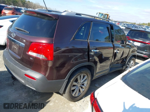 2011 Kia Sorento EX with VIN 5XYKU3A12BG089184, listed as a IAAI auction lot 41145941 with 111,597 mi miles. Bid and sale history available at carsss.com. Image 4.