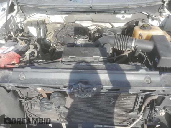 2012 Ford F-150 XL с VIN 1FTMF1CM0CKD75092, выставлен на аукционе Copart как лот 41412725 с пробегом 136 454 миль миль и Списание • Salvage title. История ставок и продаж доступна на DreamBid. Изображение 11.