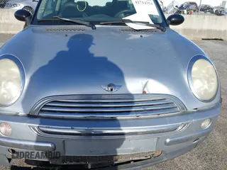 2003 MINI Hardtop with VIN WMWRC334X3TC45616, listed as a IAAI auction lot 41714354 with Not provided miles and . Bid and sale history available at DreamBid. Image 10.
