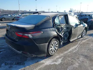 2021 Toyota Camry Hybrid LE with VIN 4T1C31AK6MU554826, listed as a IAAI auction lot 41413617 with 168,787 mi miles. Bid and sale history available at carsss.com. Image 4.