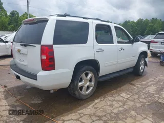 2013 Chevrolet Tahoe LS with VIN 1GNSCAE01DR260799, listed as a IAAI auction lot 42496680 with 199,276 mi miles and . Bid and sale history available at DreamBid. Image 4.