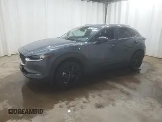 2025 Mazda CX-30 S Carbon Edition z VIN 3MVDMBCMXSM753615, wystawiony jako Copart lot #57360675 z przebiegiem 11 525 mil mil oraz Szkoda całkowita • Salvage title. Historia ofert i sprzedaży dostępna na DreamBid. Obrazek 1.
