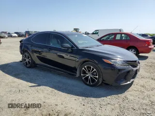 2018 Toyota Camry LE with VIN JTNB11HK9J3055995, listed as a Copart auction lot 54940115 with 110,048 mi miles and Salvage title. Bid and sale history available at DreamBid. Image 4.