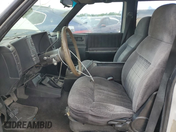 1994 GMC Jimmy Diamond Edition Luxury z VIN 1GKDT13W5R2503916, wystawiony jako Copart lot #54717215 z przebiegiem 99 991 mil mil oraz Szkoda całkowita • Salvage title. Historia ofert i sprzedaży dostępna na DreamBid. Obrazek 7.