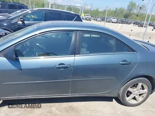 2006 Pontiac G6 6-Cyl with VIN 1G2ZG558264278824, listed as a IAAI auction lot 42255250 with 117,111 mi miles and . Bid and sale history available at DreamBid. Image 14.