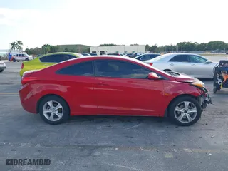 2013 Hyundai Elantra Coupe GS with VIN KMHDH6AE2DU012829, listed as a IAAI auction lot 41503736 with 89,859 mi miles. Bid and sale history available at carsss.com. Image 14.