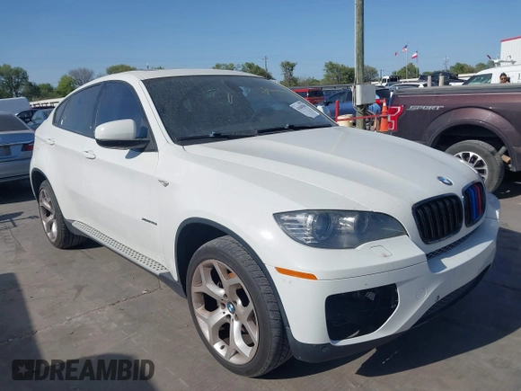 2014 BMW X6 xDrive35i z VIN 5UXFG2C5XE0C44062, wystawiony jako IAAI lot #41848304 z przebiegiem 154 683 mil mil oraz . Historia ofert i sprzedaży dostępna na DreamBid. Obrazek 1.