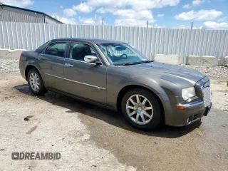 2008 Chrysler 300 C Hemi z VIN 2C3KA63H28H287802, wystawiony jako Copart lot #55748875 z przebiegiem 218 568 mil mil oraz Nie do naprawy • Non repairable. Historia ofert i sprzedaży dostępna na DreamBid. Obrazek 4.