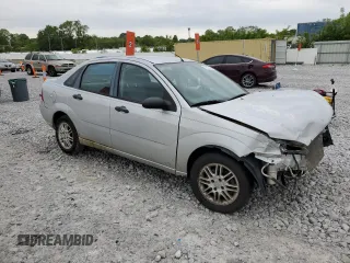 2007 Ford Focus S z VIN 1FAFP34N37W293421, wystawiony jako Copart lot #57833445 z przebiegiem 159 523 mil mil oraz Szkoda całkowita • Salvage title. Historia ofert i sprzedaży dostępna na DreamBid. Obrazek 4.