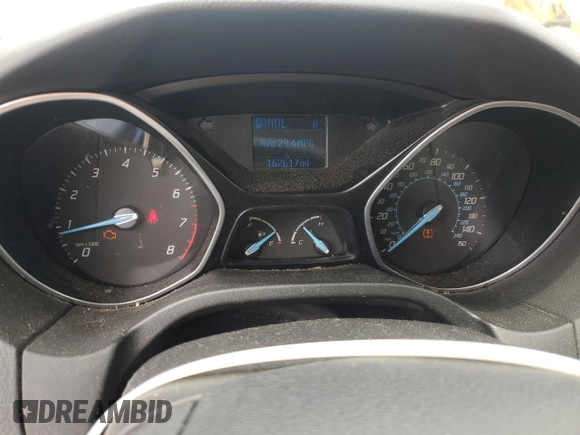 2012 Ford Focus SE with VIN 1FAHP3F28CL371926, listed as a Copart auction lot 60127115 with 162,617 mi miles and Salvage title. Bid and sale history available at DreamBid. Image 9.