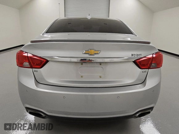 2015 Chevrolet Impala LTZ with VIN 2G1165S36F9145526, listed as a Copart auction lot 52849815 with 126,712 mi miles and Clean Title. Bid and sale history available at DreamBid. Image 6.