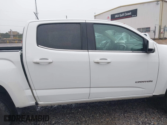2018 GMC Canyon z VIN 1GTG5CE14J1134654, wystawiony jako IAAI lot #42203541 z przebiegiem 147 881 mil mil oraz . Historia ofert i sprzedaży dostępna na DreamBid. Obrazek 13.