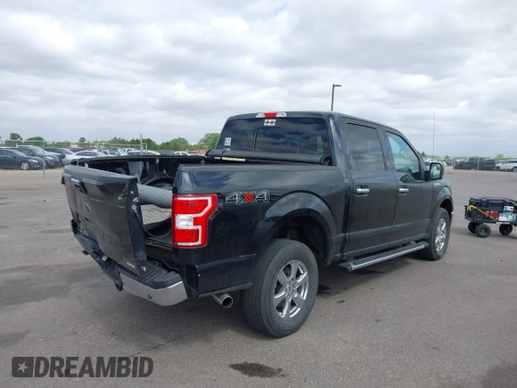 2018 Ford F-150 XL with VIN 1FTEW1EP6JKC24542, listed as a IAAI auction lot 42283242 with 127,608 mi miles and . Bid and sale history available at DreamBid. Image 4.