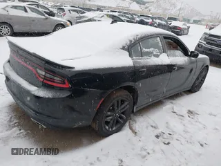 2019 Dodge Charger SXT with VIN 2C3CDXJG9KH589669, listed as a IAAI auction lot 41181924 with 30,347 mi miles and . Bid and sale history available at DreamBid. Image 4.