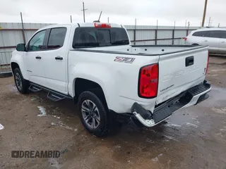 2021 Chevrolet Colorado 4WD Z71 with VIN 1GCGTDEN9M1256767, listed as a IAAI auction lot 42188311 with 55,116 mi miles and . Bid and sale history available at DreamBid. Image 3.