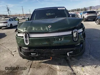2024 Rivian R1S Adventure z VIN 7PDSGABA6RN033514, wystawiony jako Copart lot #89296455 z przebiegiem Nie podano mil oraz Szkody całkowita. Historia ofert i sprzedaży dostępna na DreamBid. Obrazek 11.